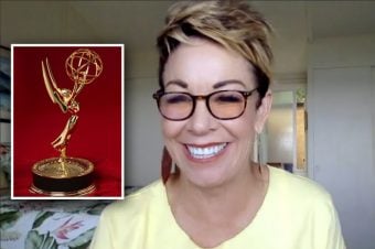 Carol smiling with an Emmy