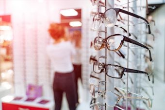 Woman choosing eyewear in a store