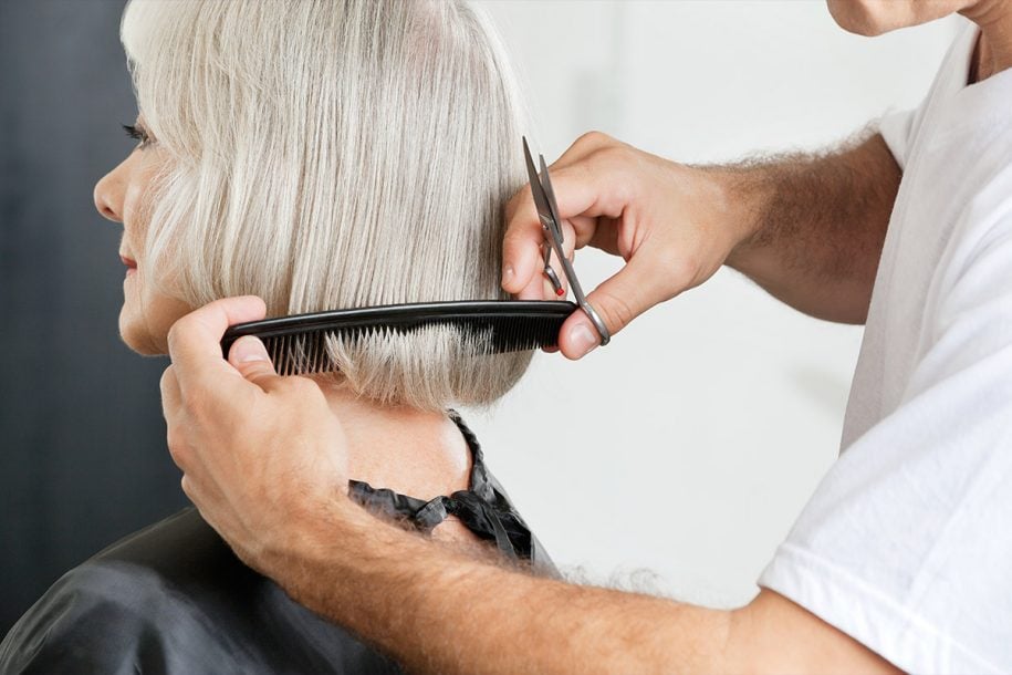 Women with gray hair at the hair stylist