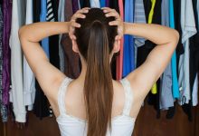 Woman standing in front of her closet - is Dressing Your Truth not working for you?